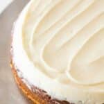 Brown cake with white frosting