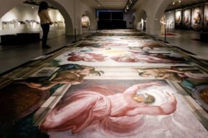 Example exhibit of ceiling of Sistine Chapel on floor