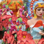 Float in Mardi Gras parade with orange costumes