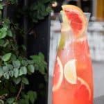 Fruit punch in jug with slices of fruit