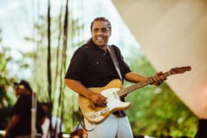 Blues artist holding guitar