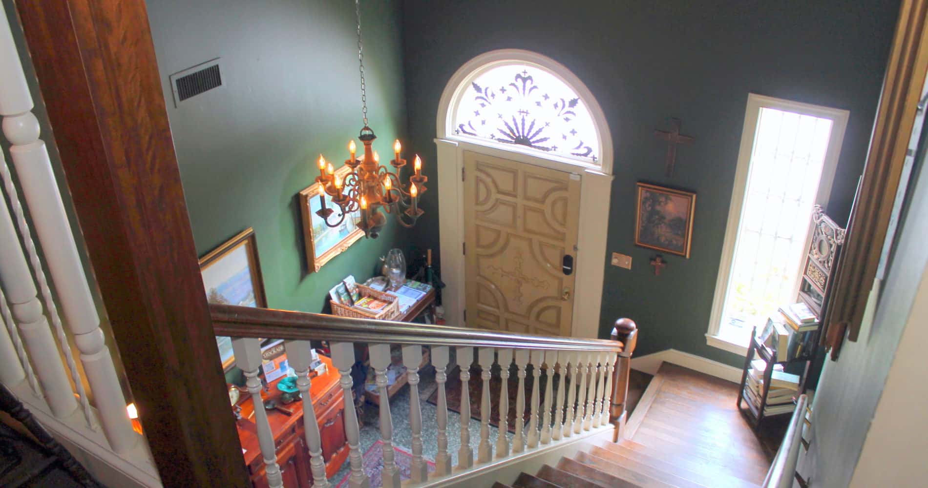 Looking down the stairs towards the front door of The Stockade