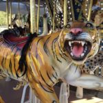 Gold tiger ride on a carousel.